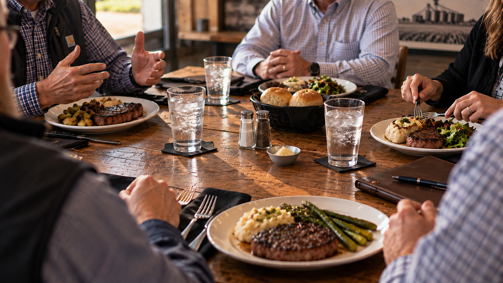 Agribusiness professionals gathered around a dinner table